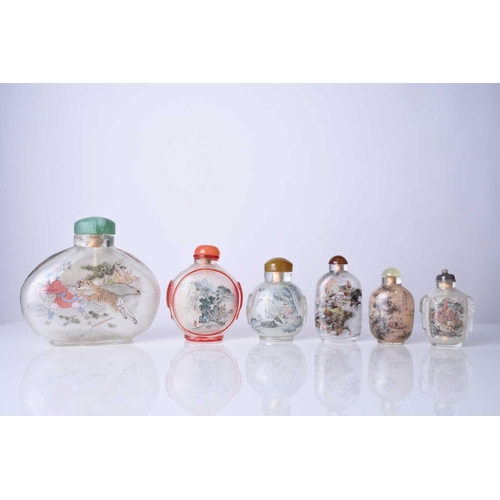 171 - A group of six Chinese internally painted glass snuff bottles, 20th century Of varying flattened ovo... 