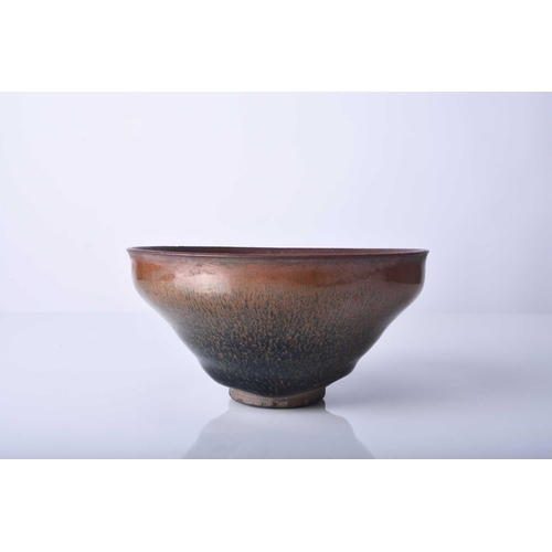 20 - A Chinese Jian ware 'hare's fur' bowl, Song Dynasty With deeply rounded sides and a fine 'ogee' rim,... 