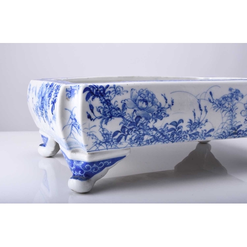 214 - A Japanese Seto blue and white porcelain jardiniere, Meiji era Of rectangular form with lobed corner... 