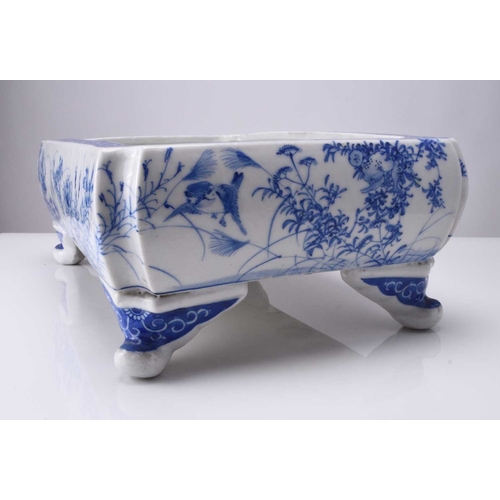 214 - A Japanese Seto blue and white porcelain jardiniere, Meiji era Of rectangular form with lobed corner... 