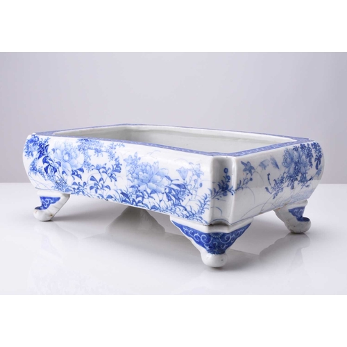 214 - A Japanese Seto blue and white porcelain jardiniere, Meiji era Of rectangular form with lobed corner... 