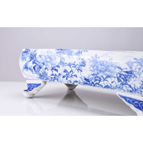 214 - A Japanese Seto blue and white porcelain jardiniere, Meiji era Of rectangular form with lobed corner... 