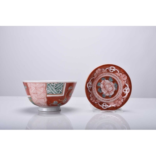 218 - A Japanese Kutani bowl and small dish, Meiji era The bowl with sinuous dragons in overlapping panels... 