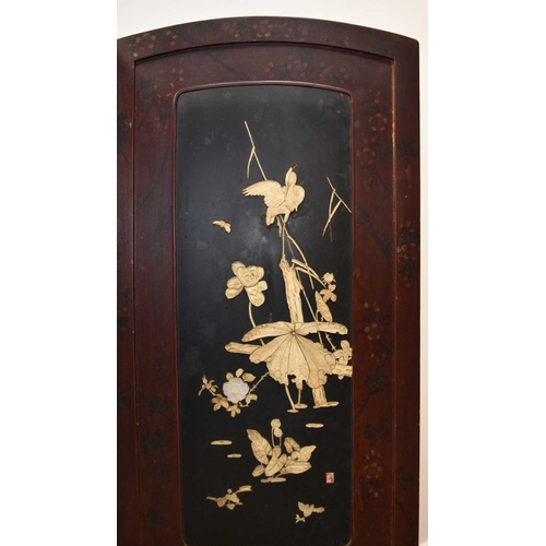 223 - A Japanese lacquer and shibayama two-fold screen Inset with panels Inlaid with bone depicting birds ... 