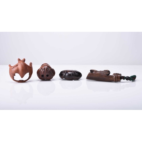 230 - A group of four Japanese wood netsuke modelled as bats, 20th century Stylistically modelled and inse... 