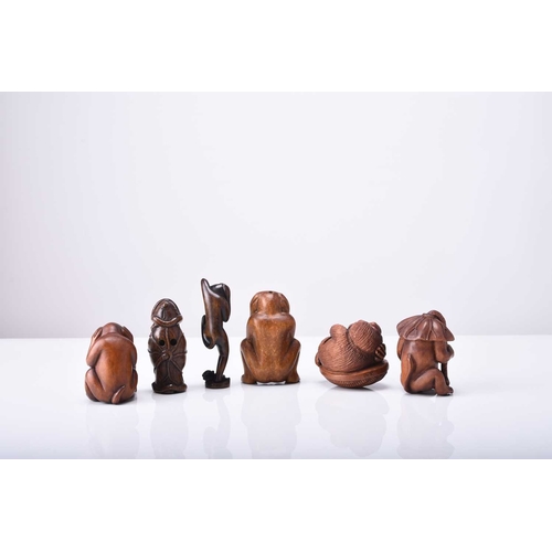 241 - A group of six Japanese wood netsuke of monkeys, 20th century Naturalistically and semi-stylisticall... 