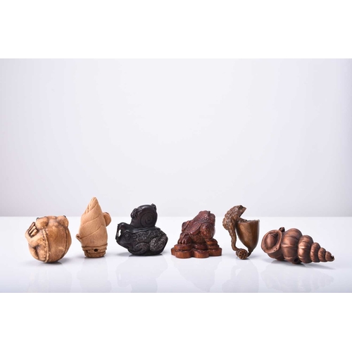 242 - A group of six Japanese wood netsuke of frogs and toads, 20th century Naturalistically and stylistic... 