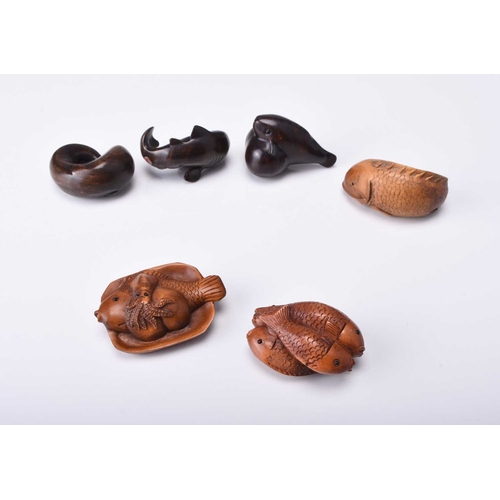 245 - A group of six Japanese wood netsuke of sealife, 20th century Naturalistically and stylistically mod... 