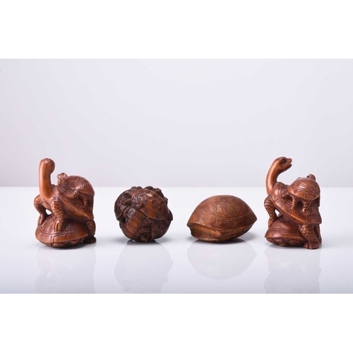 251 - A group of four Japanese wood netsuke of turtles, 20th century Naturalistically modelled, three inse... 