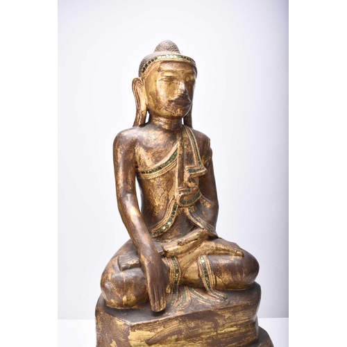 292 - A South East Asian gilt lacquer figure of a bodhisattva Early 20th century, modelled seated on a ped... 