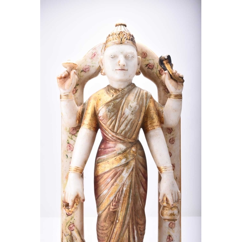 300 - An Indian alabaster sculpture of a Hindu deity, 19th century The four-armed figure modelled wearing ... 