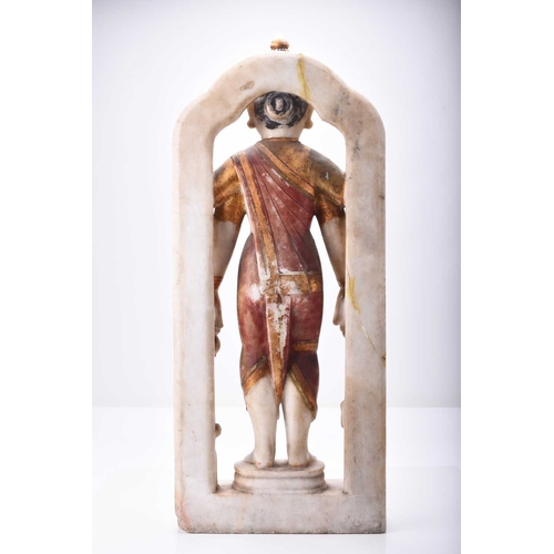 300 - An Indian alabaster sculpture of a Hindu deity, 19th century The four-armed figure modelled wearing ... 