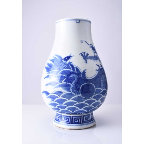 42 - A Chinese blue and white dragon vase Kangxi six-character mark but 19th century Of ovoid form with d... 