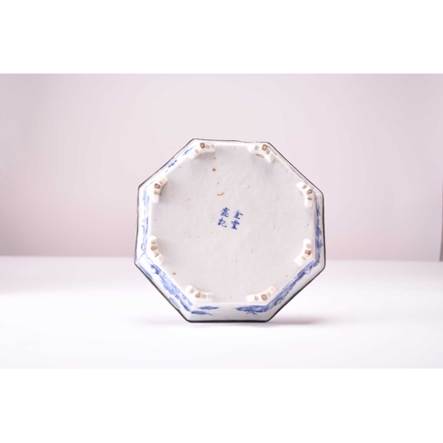 44 - A Chinese blue and white octagonal dish, 18th century Raised on eight shaped feet and decorated to t... 