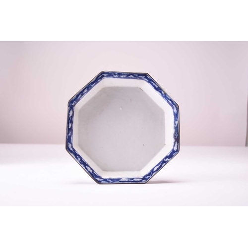 44 - A Chinese blue and white octagonal dish, 18th century Raised on eight shaped feet and decorated to t... 