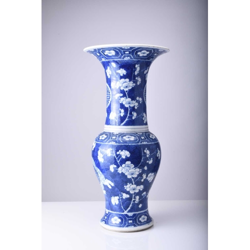 49 - A Chinese blue and white yenyen vase, 19th century Decorated with a prunus pattern on 'cracked ice' ... 