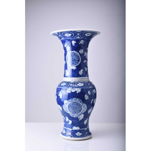 49 - A Chinese blue and white yenyen vase, 19th century Decorated with a prunus pattern on 'cracked ice' ... 