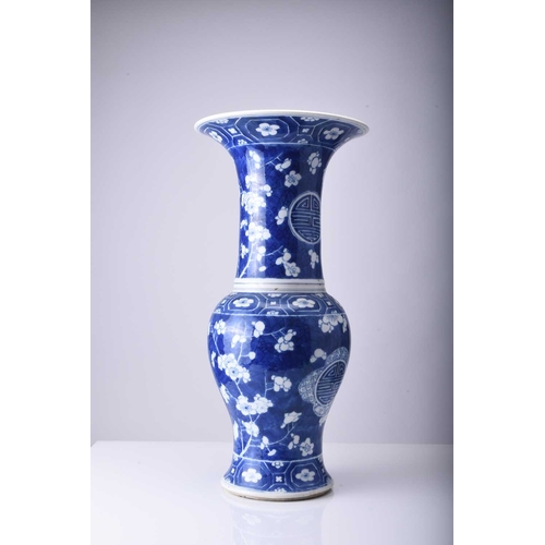 49 - A Chinese blue and white yenyen vase, 19th century Decorated with a prunus pattern on 'cracked ice' ... 