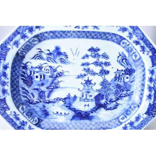 51 - A Chinese blue and white platter, 18th century Of canted rectangular form, decorated with figures an... 