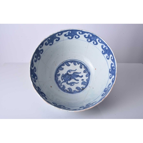 60 - A Chinese blue and white bowl, Ming Dynasty Of deep rounded form and decorated with a band of horses... 