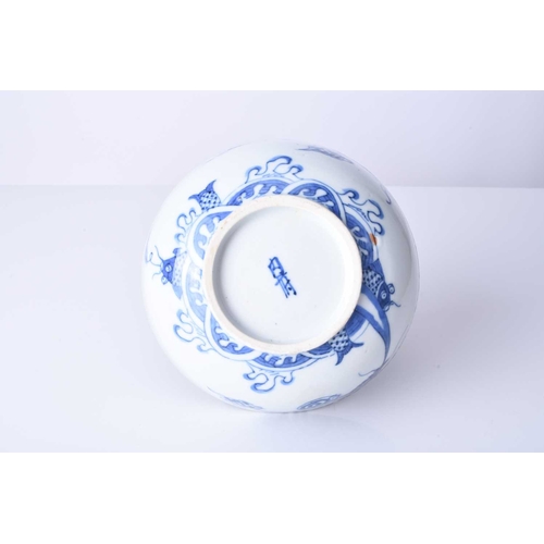 64 - A Chinese 'Bleu de Hue' blue and white dragon bowl, 18th century Of plain rounded form, decorated wi... 