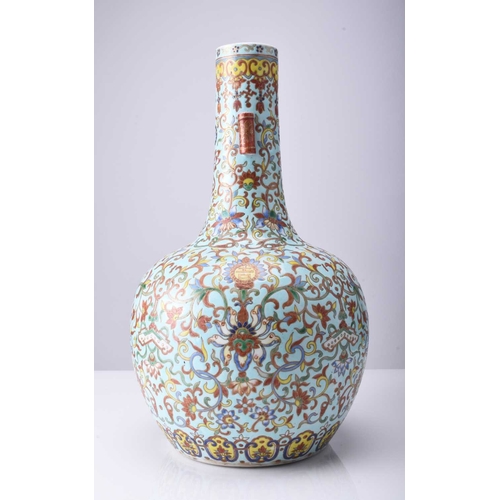 68 - A Chinese famille rose vase, tianqiuping, Jiaqing seal mark but late 19th century Of bottle form, th... 