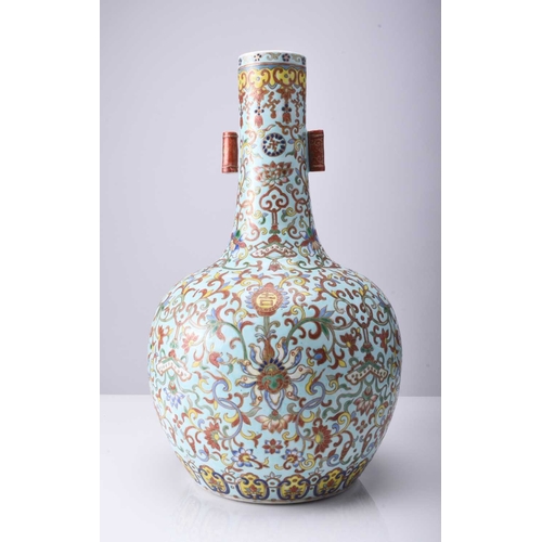 68 - A Chinese famille rose vase, tianqiuping, Jiaqing seal mark but late 19th century Of bottle form, th... 