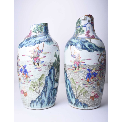 73 - A pair of large Chinese famille rose vases, 19th century Of ovoid form, decorated with opposing scen... 