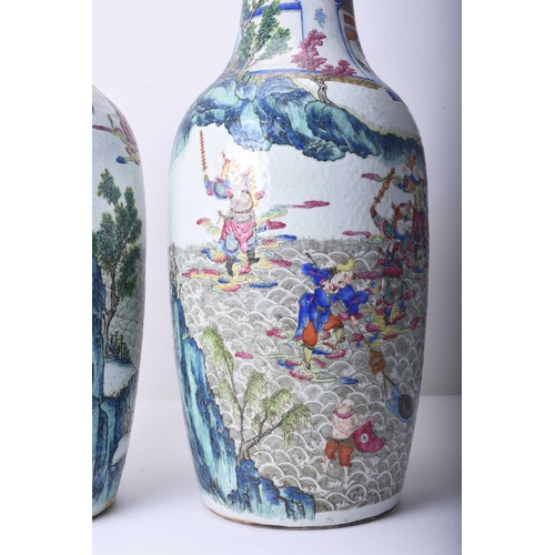 73 - A pair of large Chinese famille rose vases, 19th century Of ovoid form, decorated with opposing scen... 