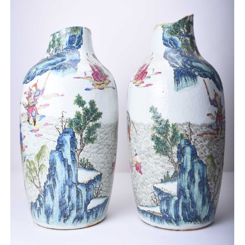 73 - A pair of large Chinese famille rose vases, 19th century Of ovoid form, decorated with opposing scen... 