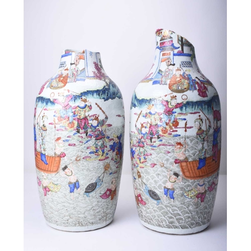 73 - A pair of large Chinese famille rose vases, 19th century Of ovoid form, decorated with opposing scen... 