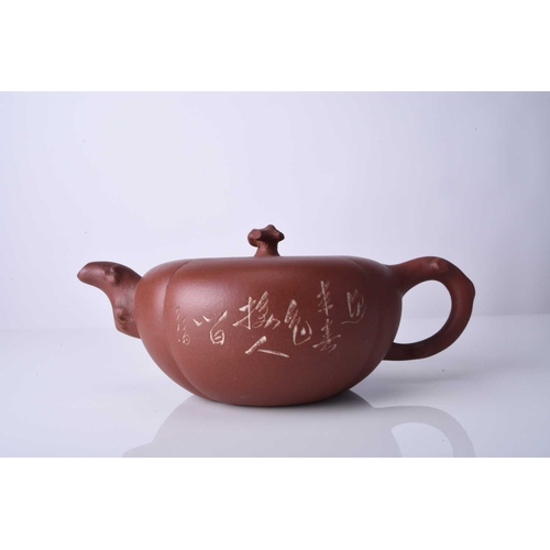 86 - Three Chinese Yixing teapots and covers, 20th century All of compressed ovoid form, the first modell... 