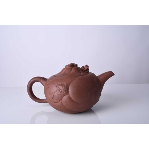 86 - Three Chinese Yixing teapots and covers, 20th century All of compressed ovoid form, the first modell... 