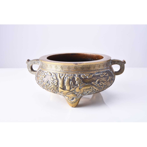 89 - A Chinese bronze censer, Xuande seal mark but 19th century Of bellied form with twin loop handles, c... 