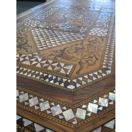 311 - A late 19th century Syrian, rectangular walnut marquetry centre table, Damascus, the top with canted... 