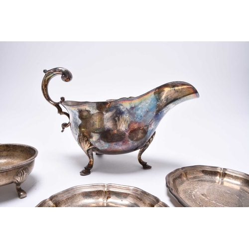 1 - A silver sauce boat, Atkin Brothers, Sheffield 1937, of typical form with cusped rim and acanthus le... 