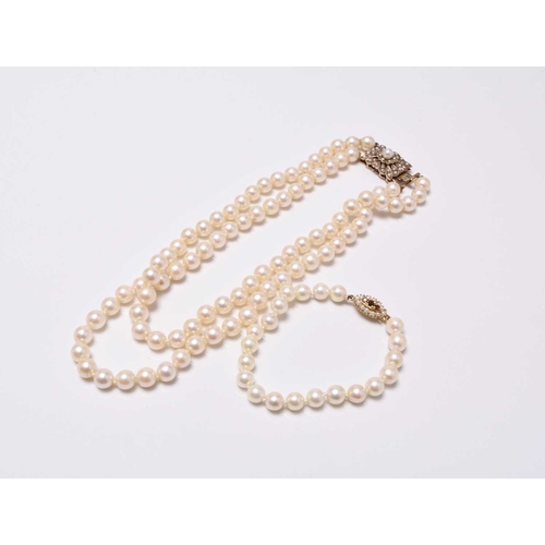 222 - A two strand cultured pearl necklace with 9ct gold pearl set clasp, 36cm long, together with a cultu... 