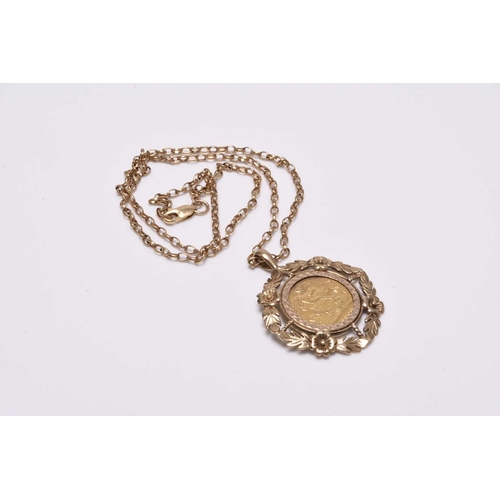 225 - A Victorian half sovereign pendant, dated 1900, within 9ct gold mount and suspended from 9ct gold ch... 