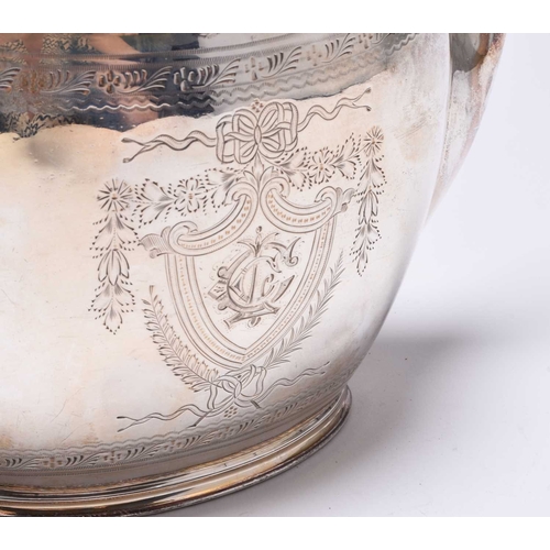 28 - A Victorian silver teapot, James Dixon & Sons Ltd, Sheffield 1891, of navette form with bright cut e... 