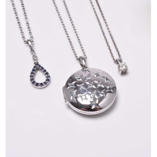 A 9ct white gold circular locket on chain, together with a 9ct white ...