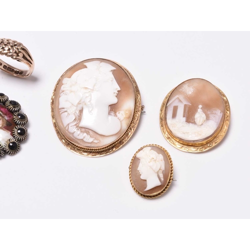 369 - An oval shell cameo brooch, depicting the profile of a classical female, mounted within yellow metal... 