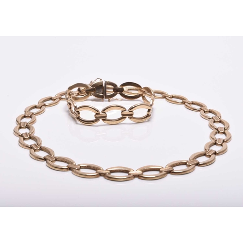 378 - A 9ct gold necklace and bracelet suite, each designed as oval open links with integral push clasps, ... 