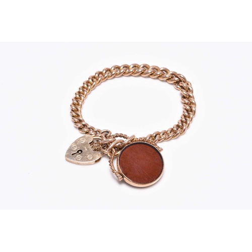 385 - A 9ct gold graduated curb link bracelet, with attached heart shaped padlock clasp and hardstone set ... 