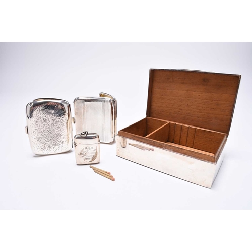 41 - A silver mounted cigarette box, Mappin & Webb, London 1902, of rectangular form with fruitwood lined... 