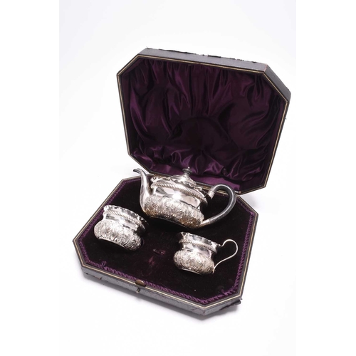 50 - A Victorian cased three piece silver tea service, Josiah Williams & Co, London 1893, each of circula... 