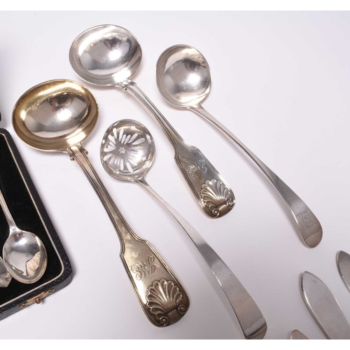 60 - A collection of silver flatware, to include; a pair of George IV Shell and Fiddle pattern sauce ladl... 