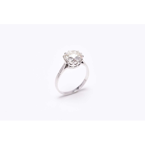 32 - A single stone diamond ring, the old cut diamond claw set in white metal to white metal shank, indis... 