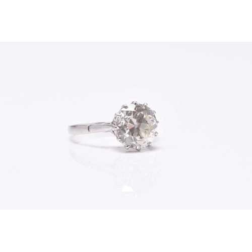 32 - A single stone diamond ring, the old cut diamond claw set in white metal to white metal shank, indis... 