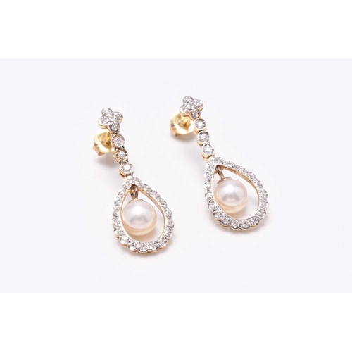 42 - A pair of Edwardian style 18ct gold cultured pearl and diamond ear pendants, each designed as a sing... 
