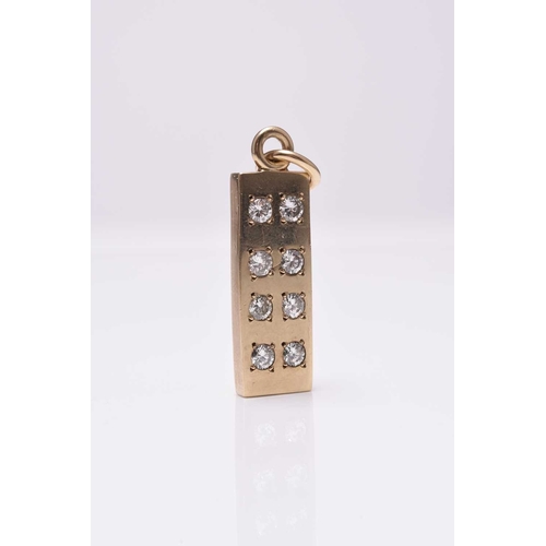 44 - A 9ct gold diamond set ingot pendant, the rectangular yellow gold ingot set with eight round brillia... 